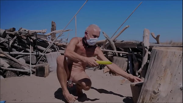 naked pathetic slave exposed at the gay beach in penis cage, outdoor, cucumber fuck, BDSM CBT