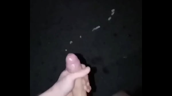Naked Twink shooting cum in the middle of the street at night