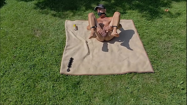 naked pathetic slave tied up outdoor, dildo in ass, crushed beverage can with sphincter,